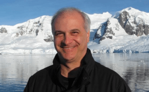 Photo of Mark Terry with snow and ice behind him. 